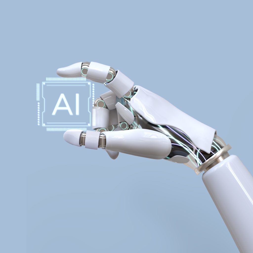 A futuristic robotic hand with sleek white plating and exposed glowing circuits delicately holds a holographic AI microchip against a light blue background. The microchip emits a digital glow, symbolizing advanced machine learning and neural networks. This visually striking representation is ideal for understanding artificial intelligence basics, showcasing how AI and robotics integrate to drive technological innovation.